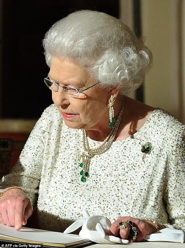 The Queen wearing Emerald & Diamond Gold Parure worn by Kate Middleton during Royal Caribbean Tour