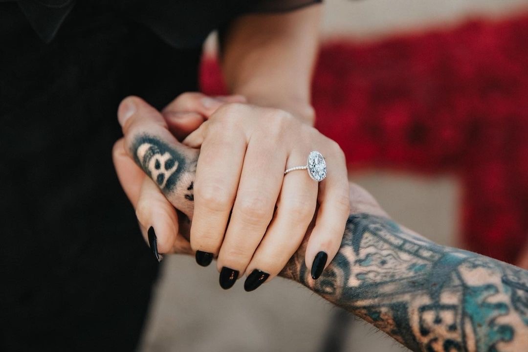 Kourtney Kardashian wearing new diamond engagement ring