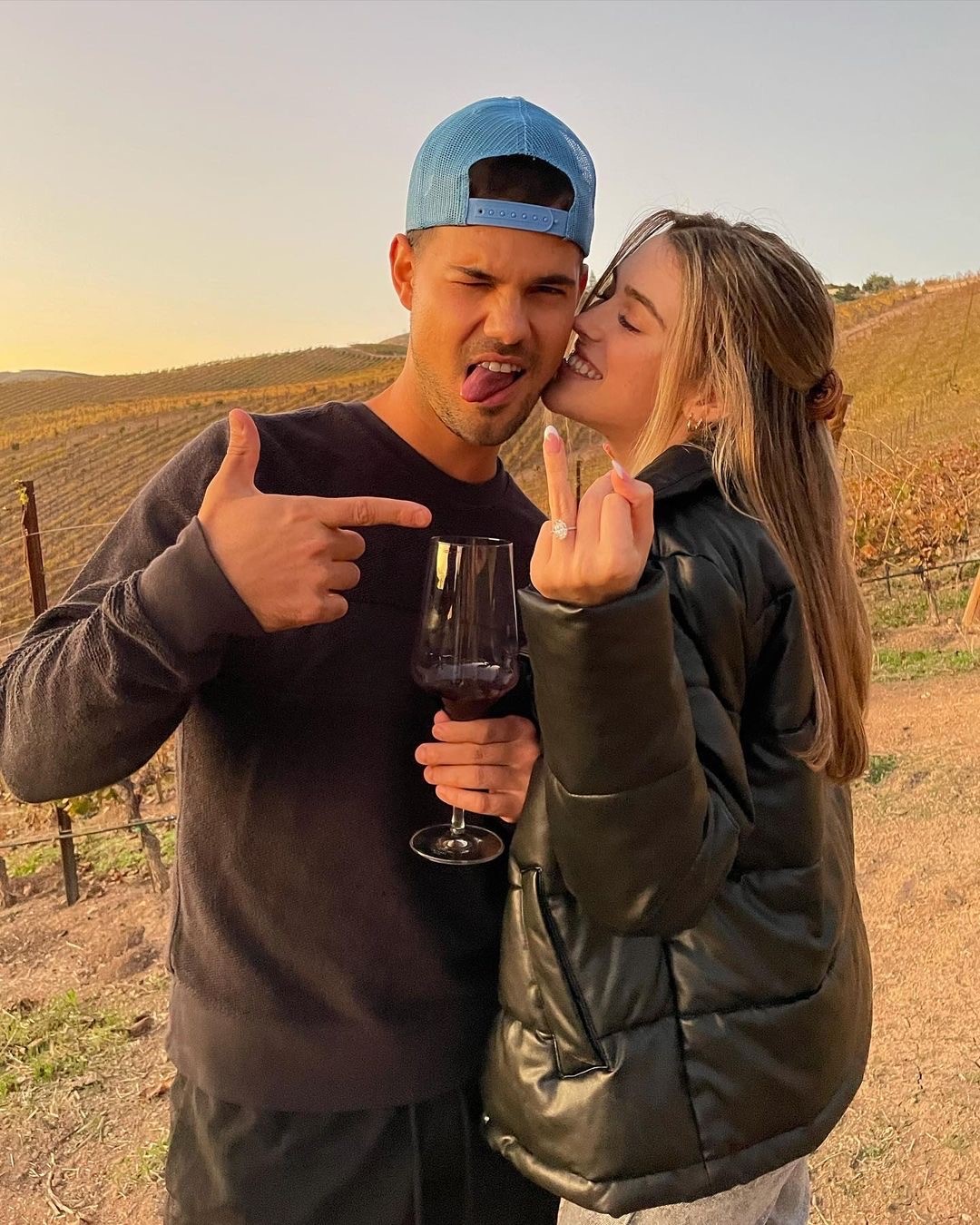 Taylor Lautner and Taylor Dome Pose for Photo Showing Off Engagement Ring