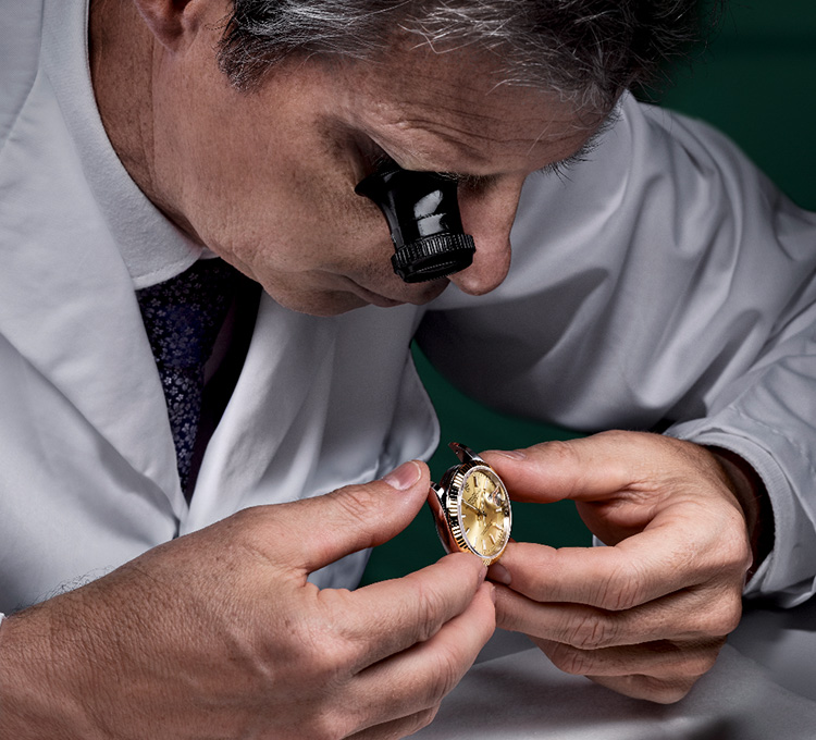 Watchmaker Inspecting a Rolex Watch